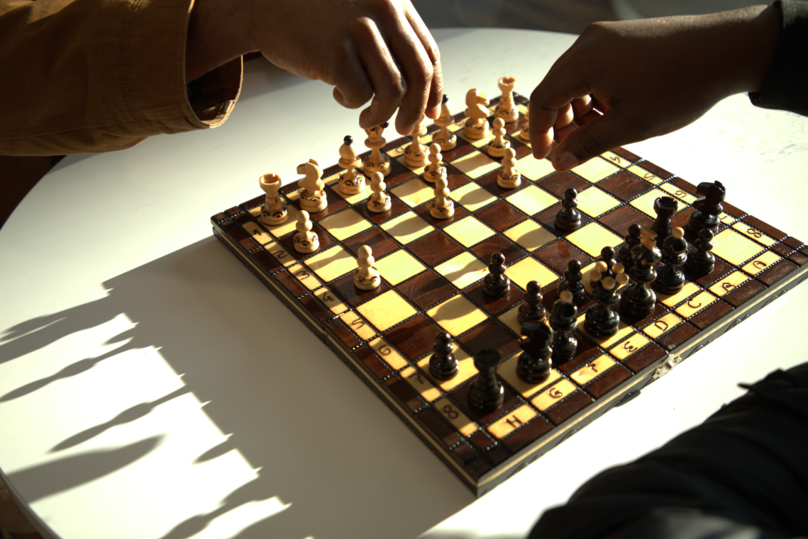 Two people playing chess