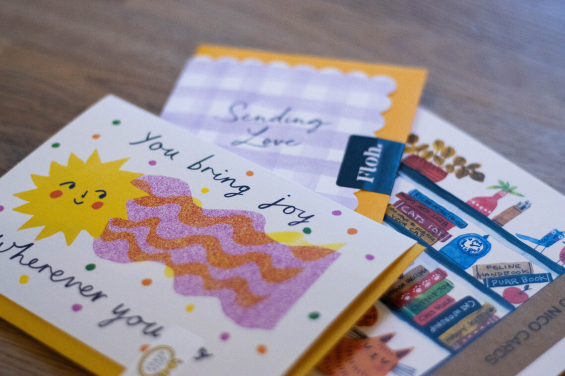 Cards, one depicting the statement: "You bring joy wherever you go"